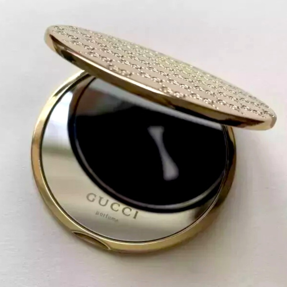 Gucci gold mirror (New)